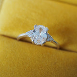 Oval cluster Solitare Ring